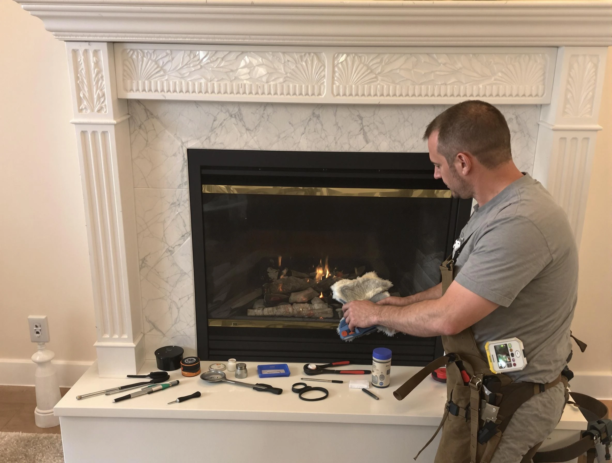 Los Lunas Chimney Sweep performing fireplace maintenance in Los Lunas, NM